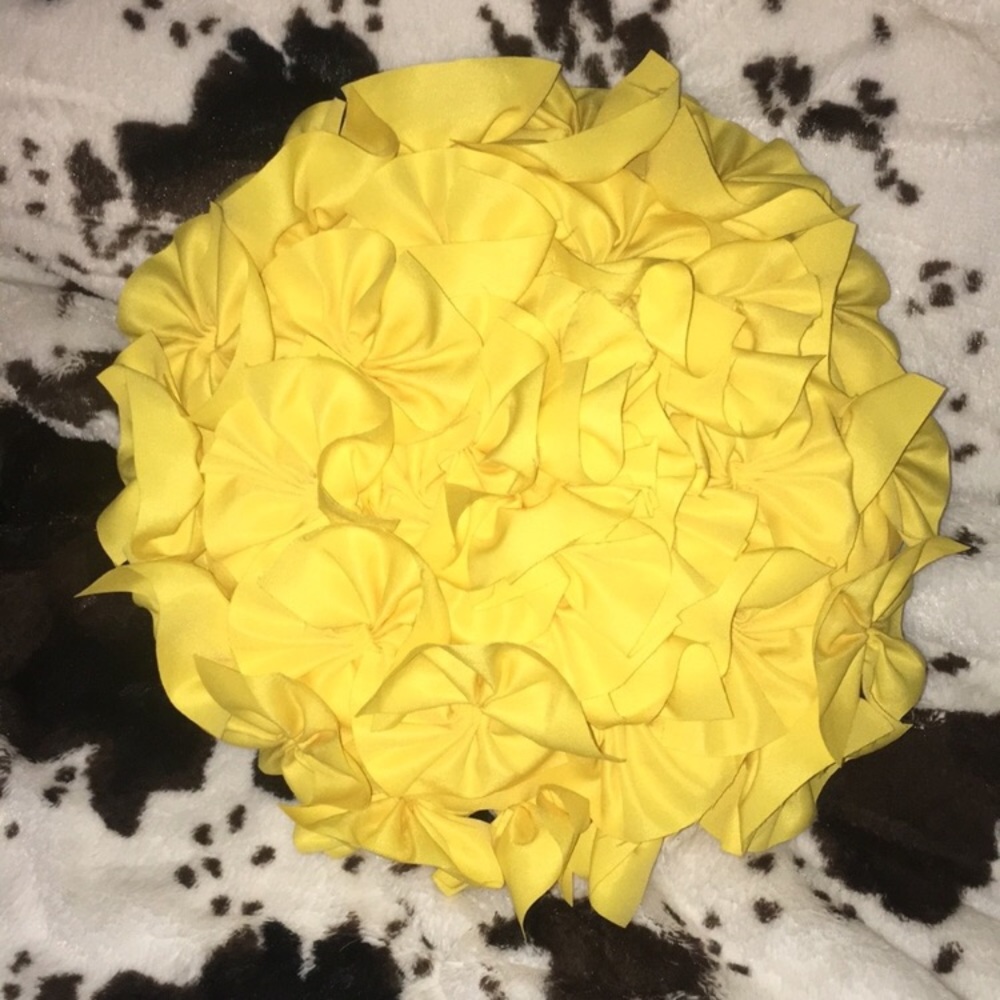 Bright yellow decorative pillow